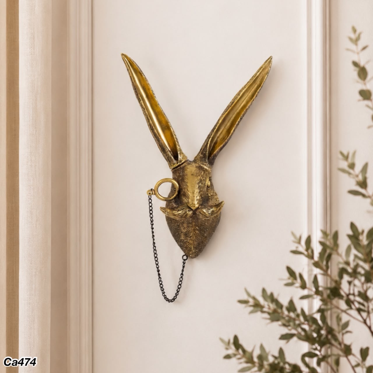 Articulo decorativo conejo dorado de pared 14cm* 10cm* 26,5cm